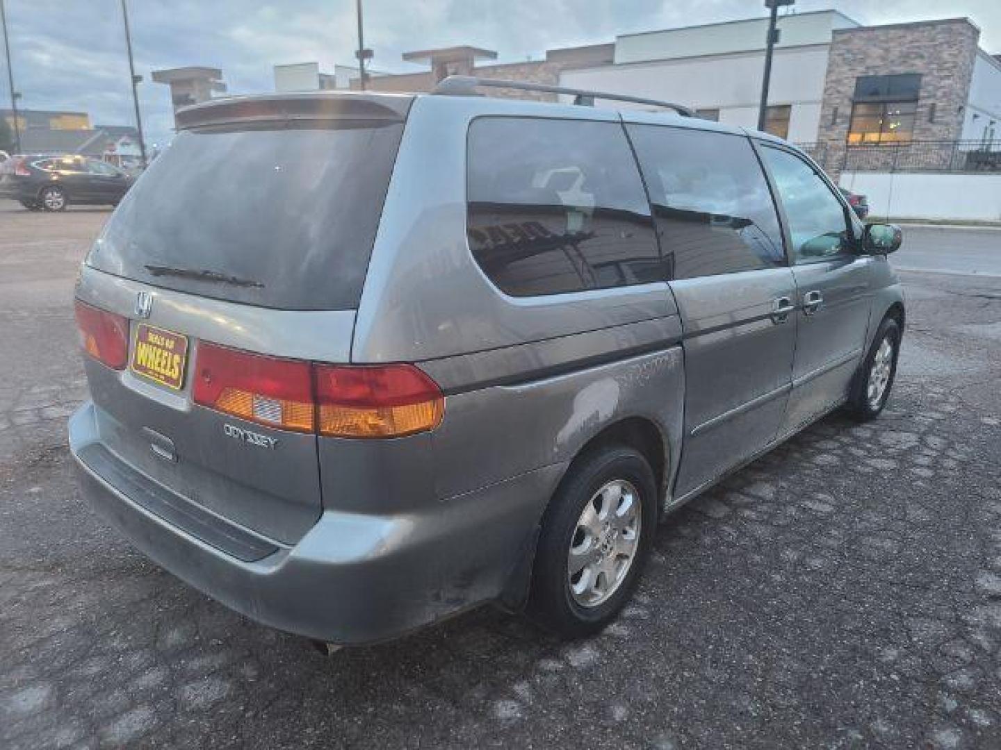 2002 Honda Odyssey EX (2HKRL18642H) with an 3.5L V6 SOHC 24V engine, 5-Speed Automatic transmission, located at 1800 West Broadway, Missoula, 59808, (406) 543-1986, 46.881348, -114.023628 - Photo#3