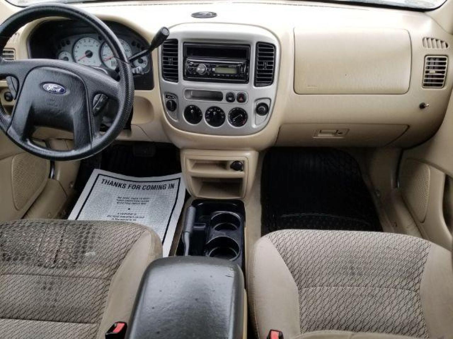 2004 Oxford White Ford Escape XLT 4WD (1FMYU93114D) with an 3.0L V6 DOHC 24V engine, 4-Speed Automatic transmission, located at 1821 N Montana Ave., Helena, MT, 59601, 0.000000, 0.000000 - Photo#11