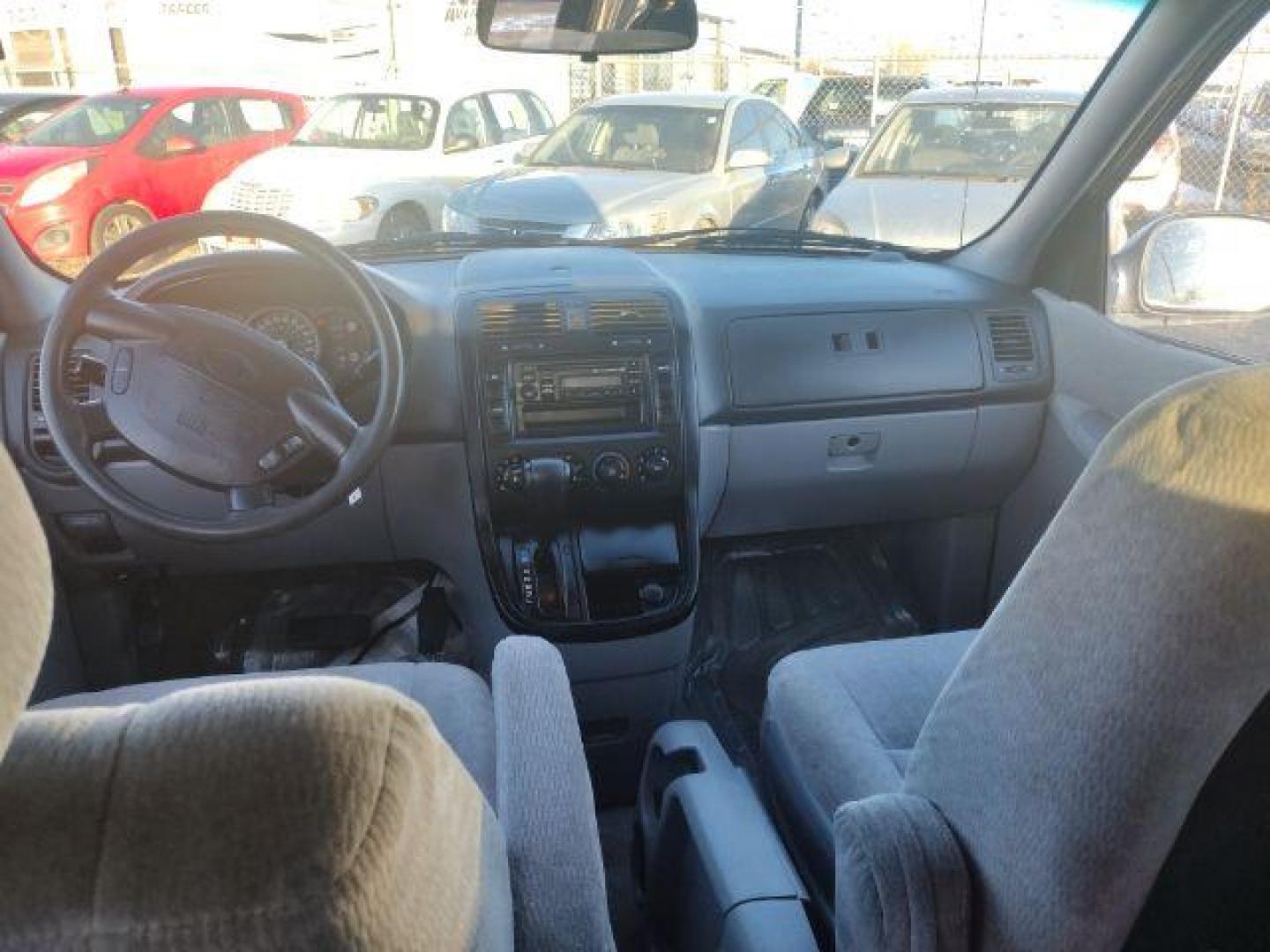 2004 Kia Sedona LX (KNDUP131X46) with an 3.5L V6 DOHC 16V engine, 5-Speed Automatic transmission, located at 4801 10th Ave S,, Great Falls, MT, 59405, 0.000000, 0.000000 - Photo#9