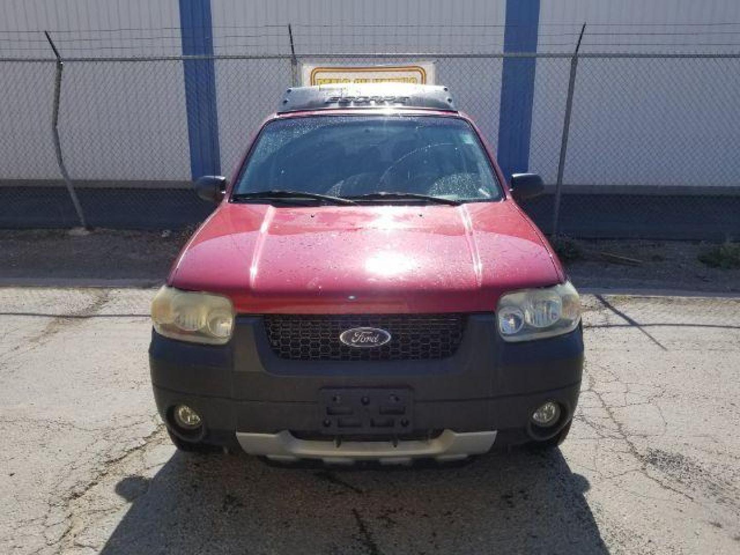 2005 Red Fire Metallic Ford Escape XLT 4WD (1FMYU93125K) with an 3.0L V6 DOHC 24V engine, 4-Speed Automatic transmission, located at 4801 10th Ave S,, Great Falls, MT, 59405, 0.000000, 0.000000 - Photo#1