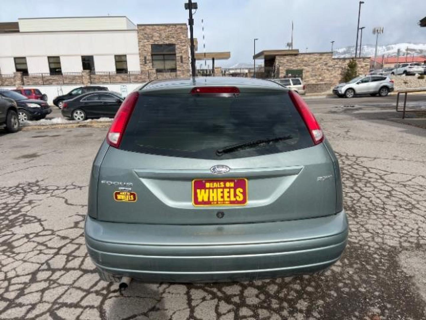 2005 Ford Focus ZX5 SES (3FAHP37N85R) with an 2.0L L4 DOHC 16V engine, located at 4047 Montana Ave., Billings, MT, 59101, 45.770847, -108.529800 - Photo#4