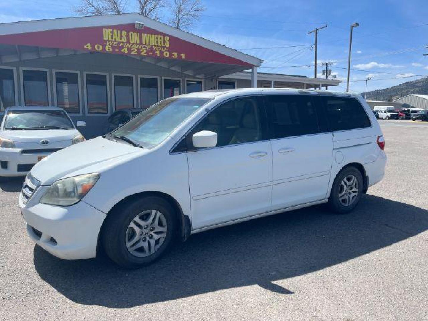 2005 Honda Odyssey EX w/ Leather DVD (5FNRL38745B) with an 3.5L V6 SOHC 24V engine, 5-Speed Automatic transmission, located at 1821 N Montana Ave., Helena, MT, 59601, 0.000000, 0.000000 - Photo#0