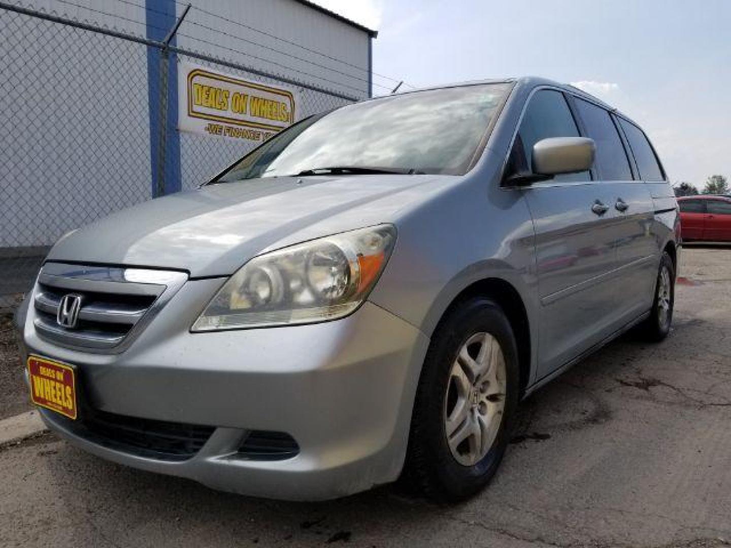 2005 Honda Odyssey EX w/ Leather DVD (5FNRL38735B) with an 3.5L V6 SOHC 24V engine, 5-Speed Automatic transmission, located at 601 E. Idaho St., Kalispell, MT, 59901, 0.000000, 0.000000 - Photo#0