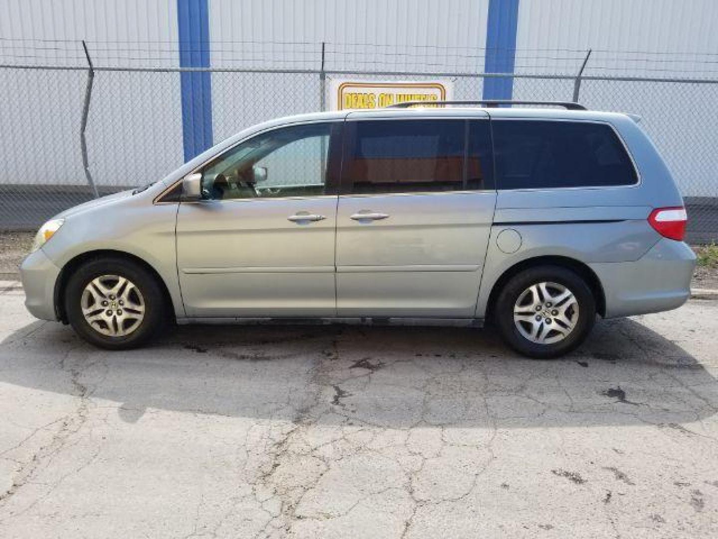 2005 Honda Odyssey EX w/ Leather DVD (5FNRL38735B) with an 3.5L V6 SOHC 24V engine, 5-Speed Automatic transmission, located at 601 E. Idaho St., Kalispell, MT, 59901, 0.000000, 0.000000 - Photo#3