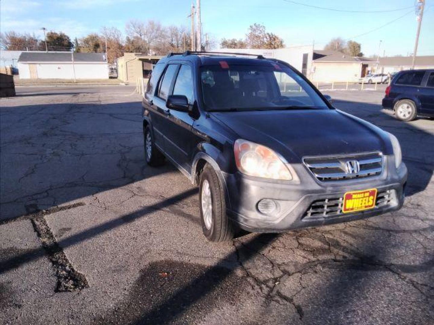 2006 Honda CR-V EX 4WD AT (JHLRD78806C) with an 2.4L L4 DOHC 16V engine, 5-Speed Automatic transmission, located at 4047 Montana Ave., Billings, MT, 59101, 45.770847, -108.529800 - Photo#3