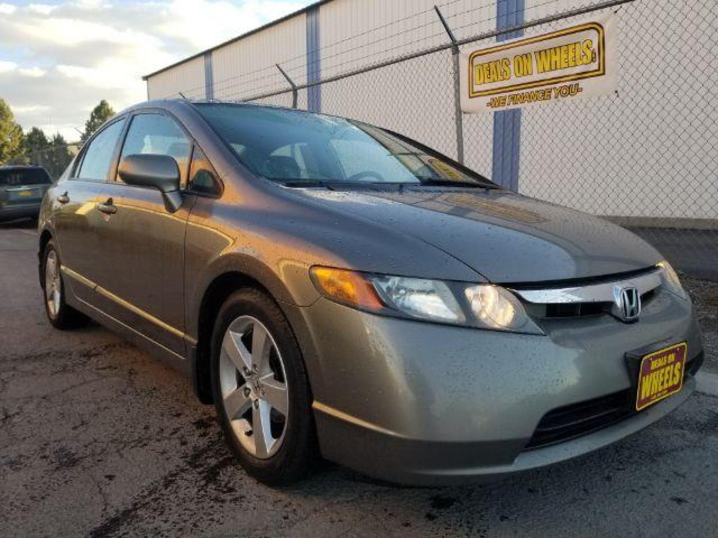 2006 Honda Civic EX Sedan AT (1HGFA16806L) with an 1.8L L4 SOHC 16V engine, 5-Speed Automatic transmission, located at 4047 Montana Ave., Billings, MT, 59101, 45.770847, -108.529800 - Photo#2