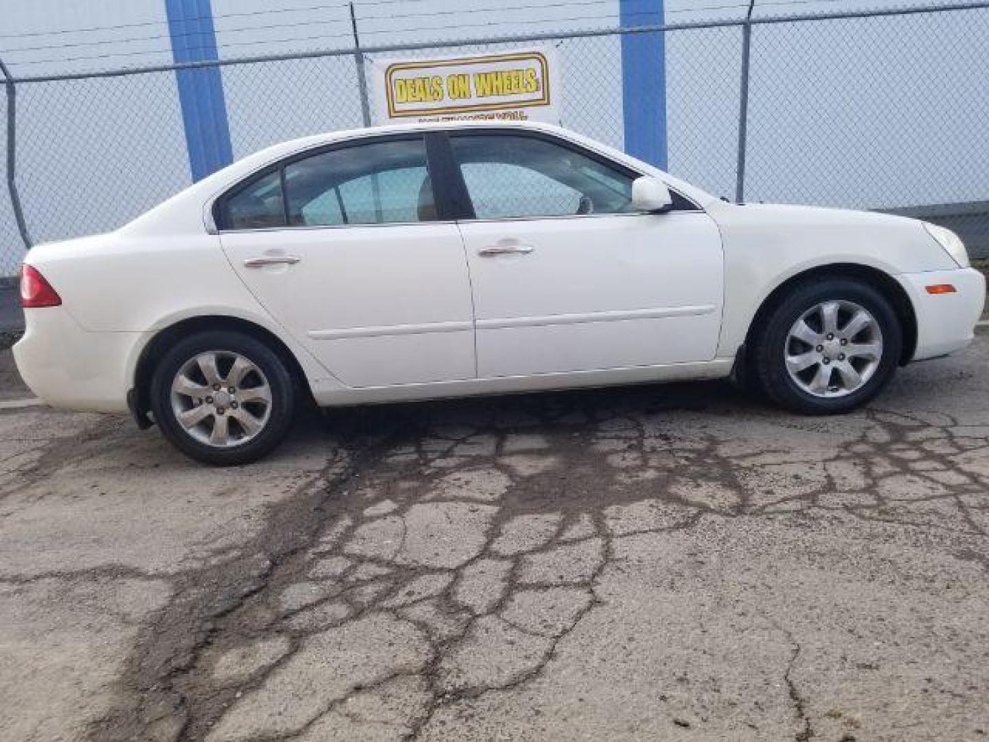 2006 Kia Optima EX V6 (KNAGE124965) with an 2.7L V6 24V DOHC engine, 4-Speed Automatic transmission, located at 601 E. Idaho St., Kalispell, MT, 59901, 0.000000, 0.000000 - Photo#3