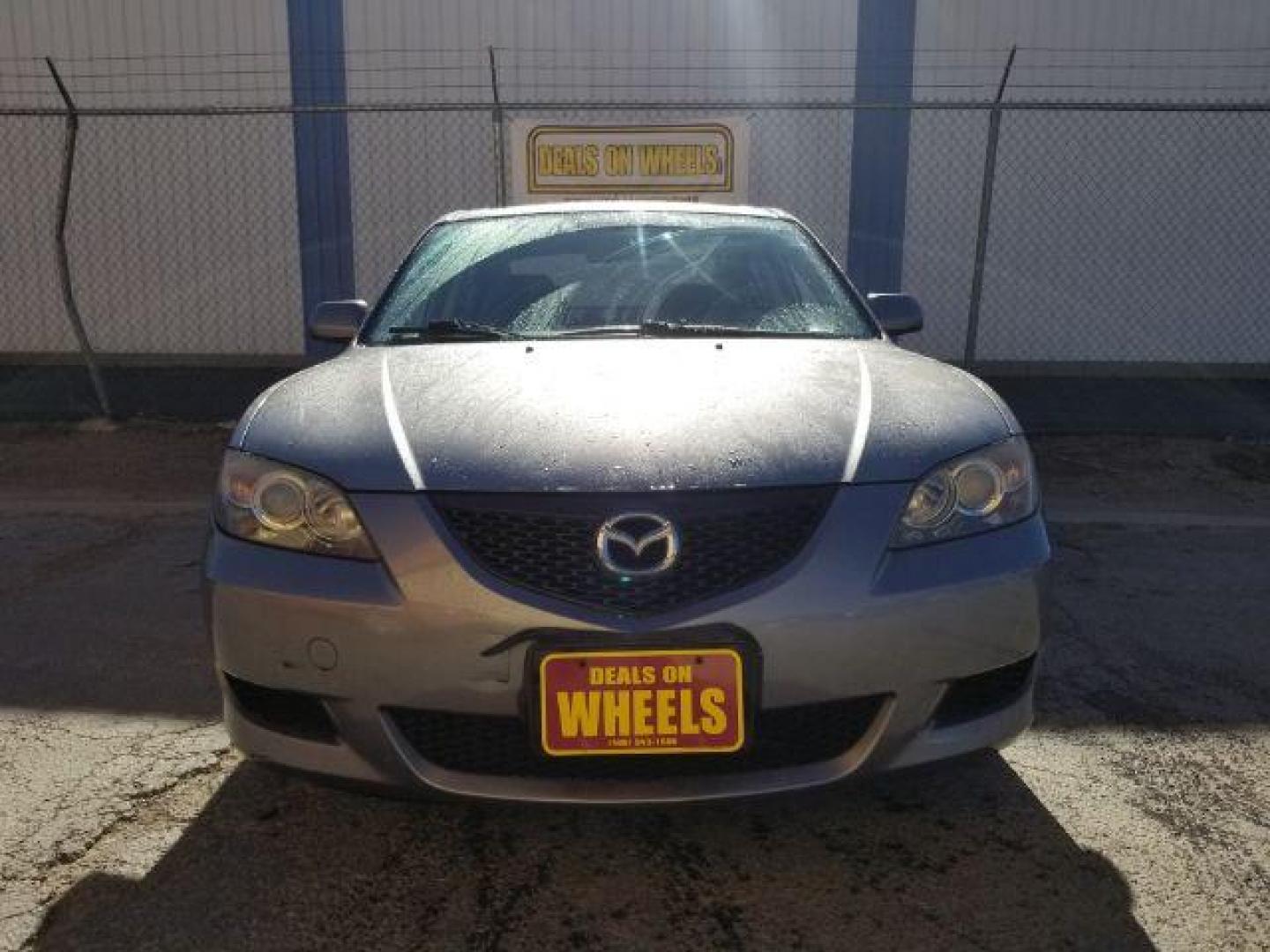 2006 Mazda MAZDA3 i 4-door (JM1BK12FX61) with an 2.0L L4 DOHC 16V engine, located at 601 E. Idaho St., Kalispell, MT, 59901, 0.000000, 0.000000 - Photo#1