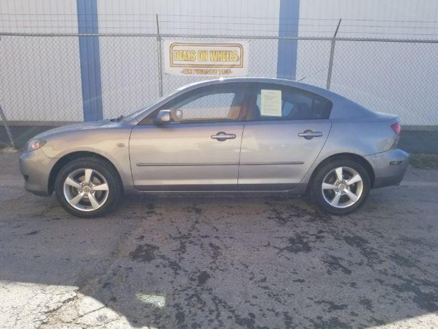 2006 Mazda MAZDA3 i 4-door (JM1BK12FX61) with an 2.0L L4 DOHC 16V engine, located at 601 E. Idaho St., Kalispell, MT, 59901, 0.000000, 0.000000 - Photo#2