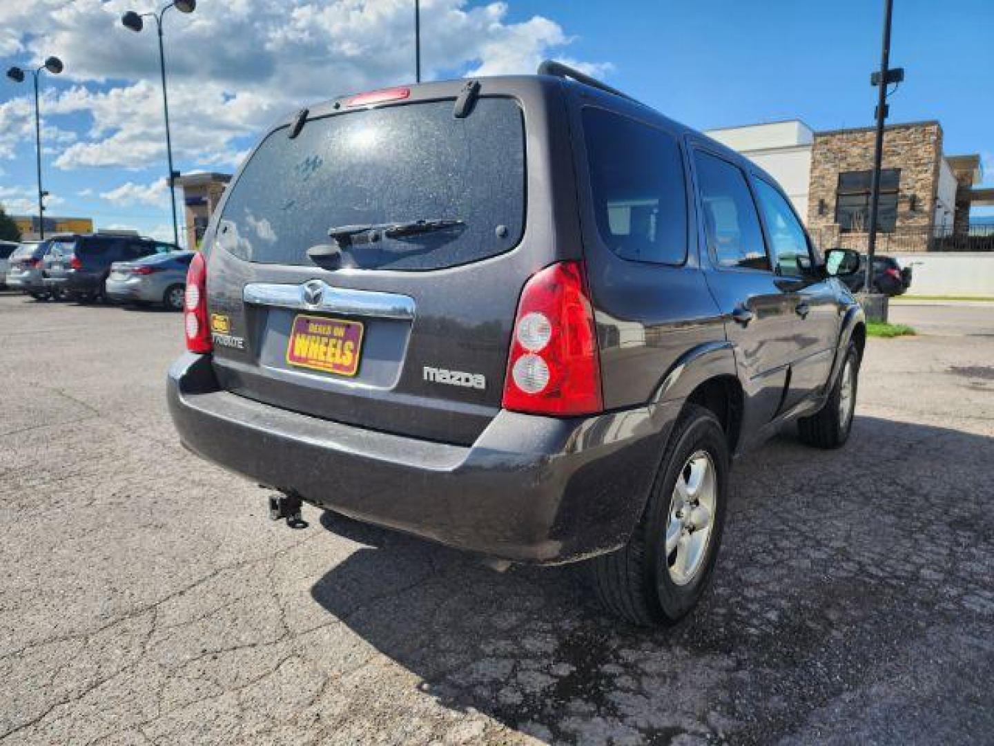 2006 Stormfront Gray Metallic Mazda Tribute s 4WD 4-spd AT (4F2CZ941X6K) with an 3.0L V6 DOHC 24V engine, 4-Speed Automatic transmission, located at 1800 West Broadway, Missoula, 59808, (406) 543-1986, 46.881348, -114.023628 - Photo#3