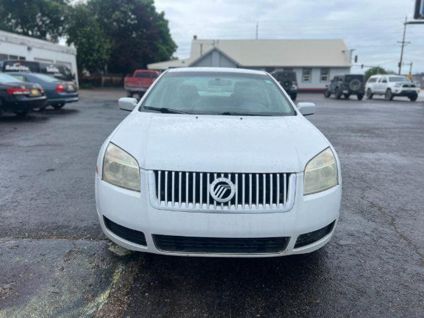 2006 Mercury Milan V6 Premier (3MEFM08106R) with an 3.0L V6 DOHC 24V engine, 6-Speed Automatic transmission, located at 4047 Montana Ave., Billings, MT, 59101, 45.770847, -108.529800 - Photo#7