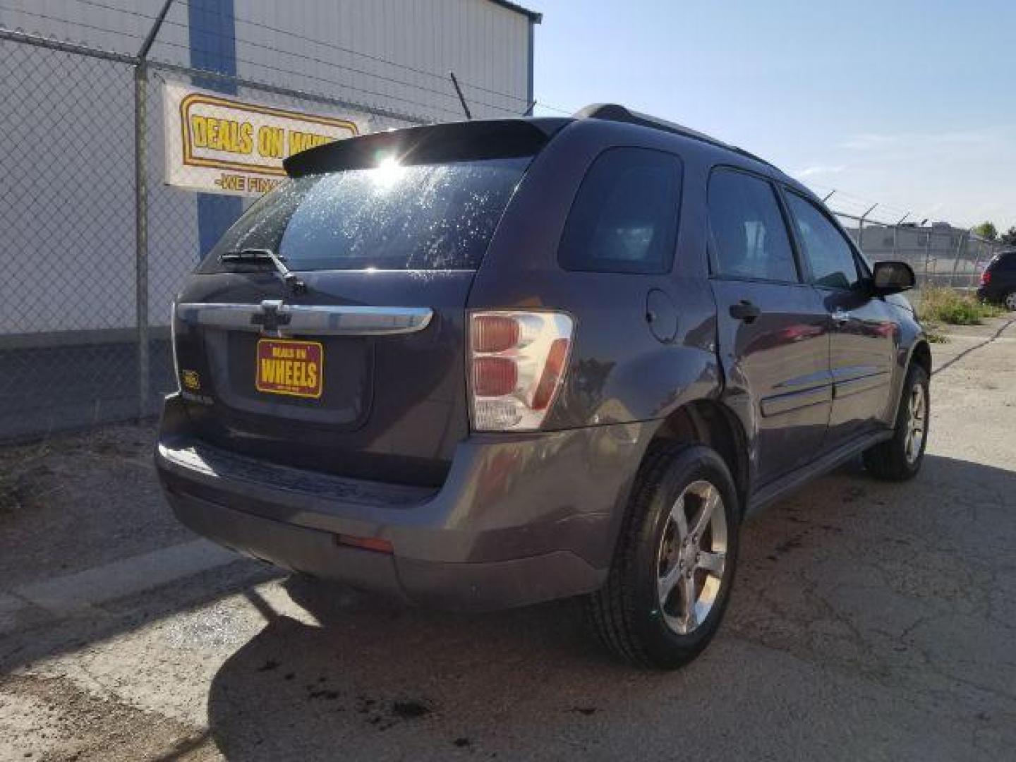 2007 Granite Gray Metalli Chevrolet Equinox LS 2WD (2CNDL13F976) with an 3.4L V6 OHV 12V engine, 5-Speed Automatic transmission, located at 4801 10th Ave S,, Great Falls, MT, 59405, 0.000000, 0.000000 - Photo#4