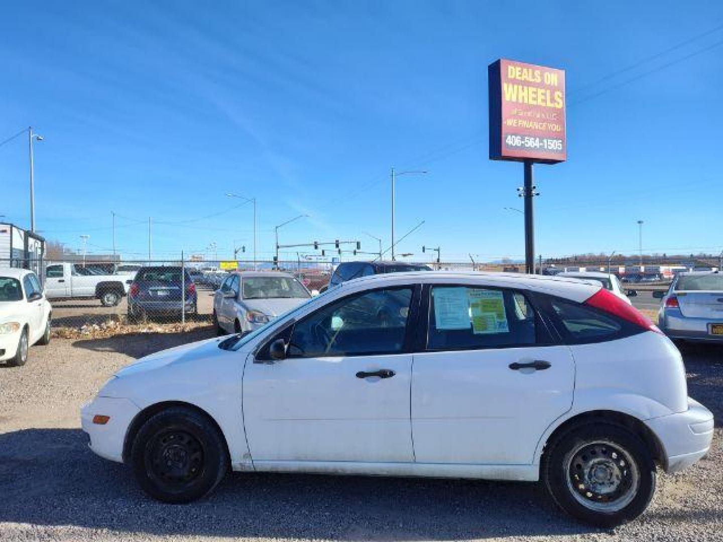 2007 Ford Focus ZX5 SE (1FAHP37N67W) with an 2.0L L4 DOHC 16V engine, located at 4801 10th Ave S,, Great Falls, MT, 59405, 0.000000, 0.000000 - Photo#1