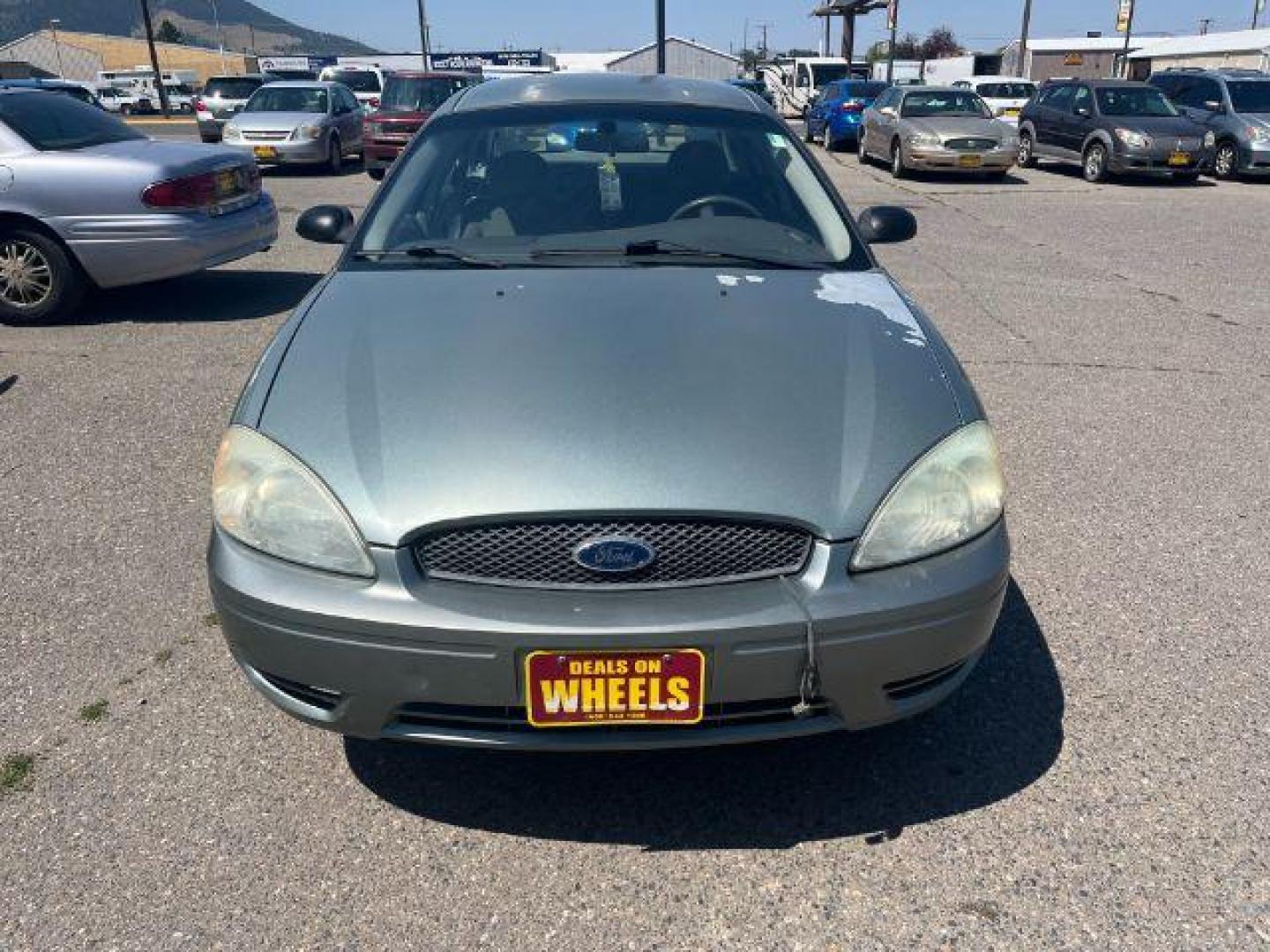 2007 Green Ford Taurus n/a (1FAFP53UX7A) with an 3.0 L engine, located at 1821 N Montana Ave., Helena, MT, 59601, 0.000000, 0.000000 - Photo#1