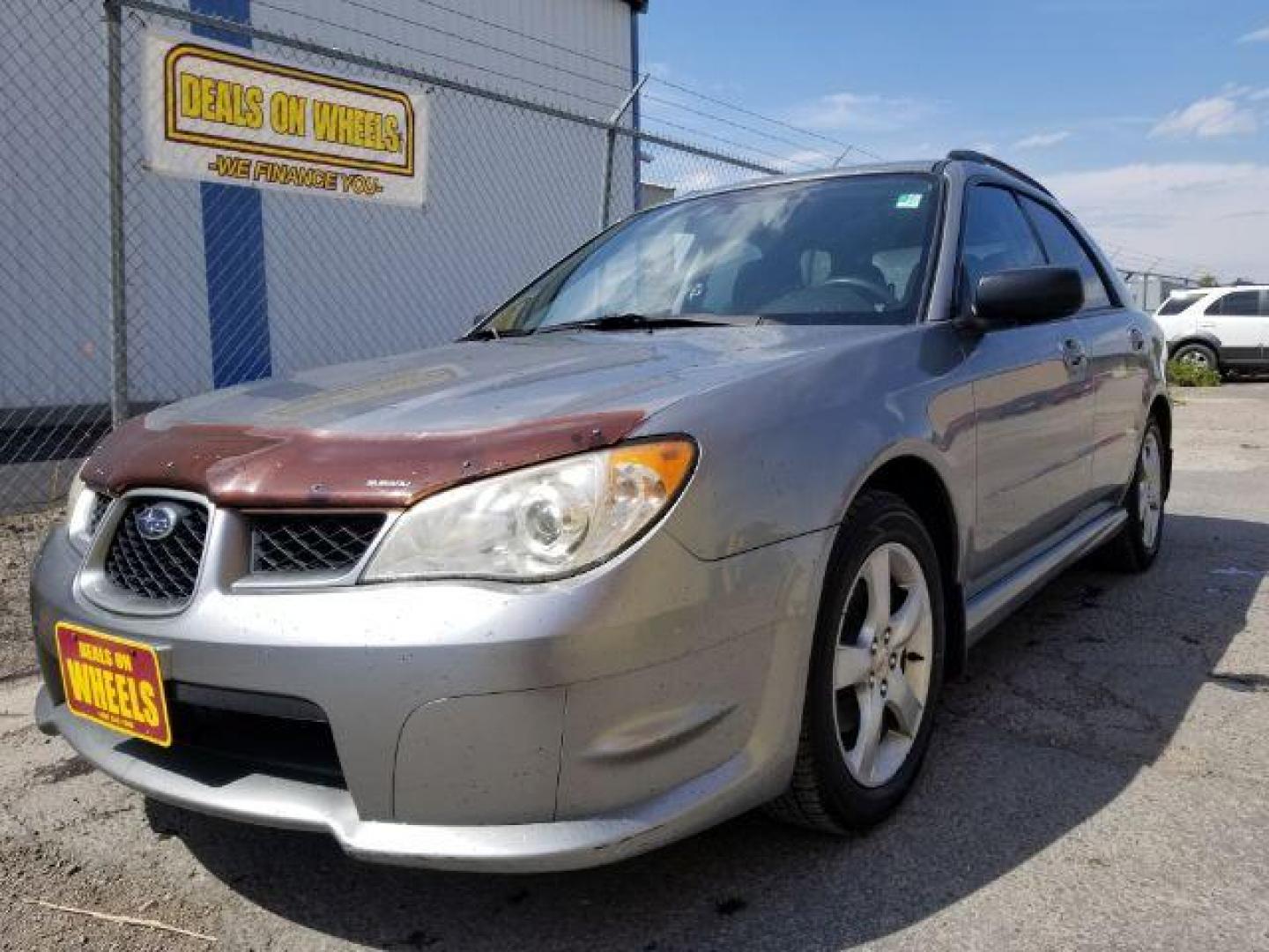 2007 Subaru Impreza Wagon 2.5i (JF1GG61677H) with an 2.5L H4 SOHC 16V engine, 4-Speed Automatic transmission, located at 4047 Montana Ave., Billings, MT, 59101, 45.770847, -108.529800 - Photo#0