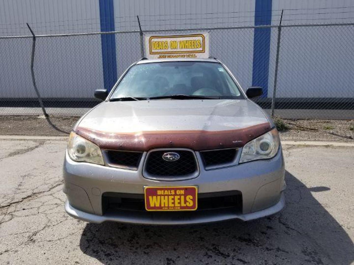 2007 Subaru Impreza Wagon 2.5i (JF1GG61677H) with an 2.5L H4 SOHC 16V engine, 4-Speed Automatic transmission, located at 4047 Montana Ave., Billings, MT, 59101, 45.770847, -108.529800 - Photo#1