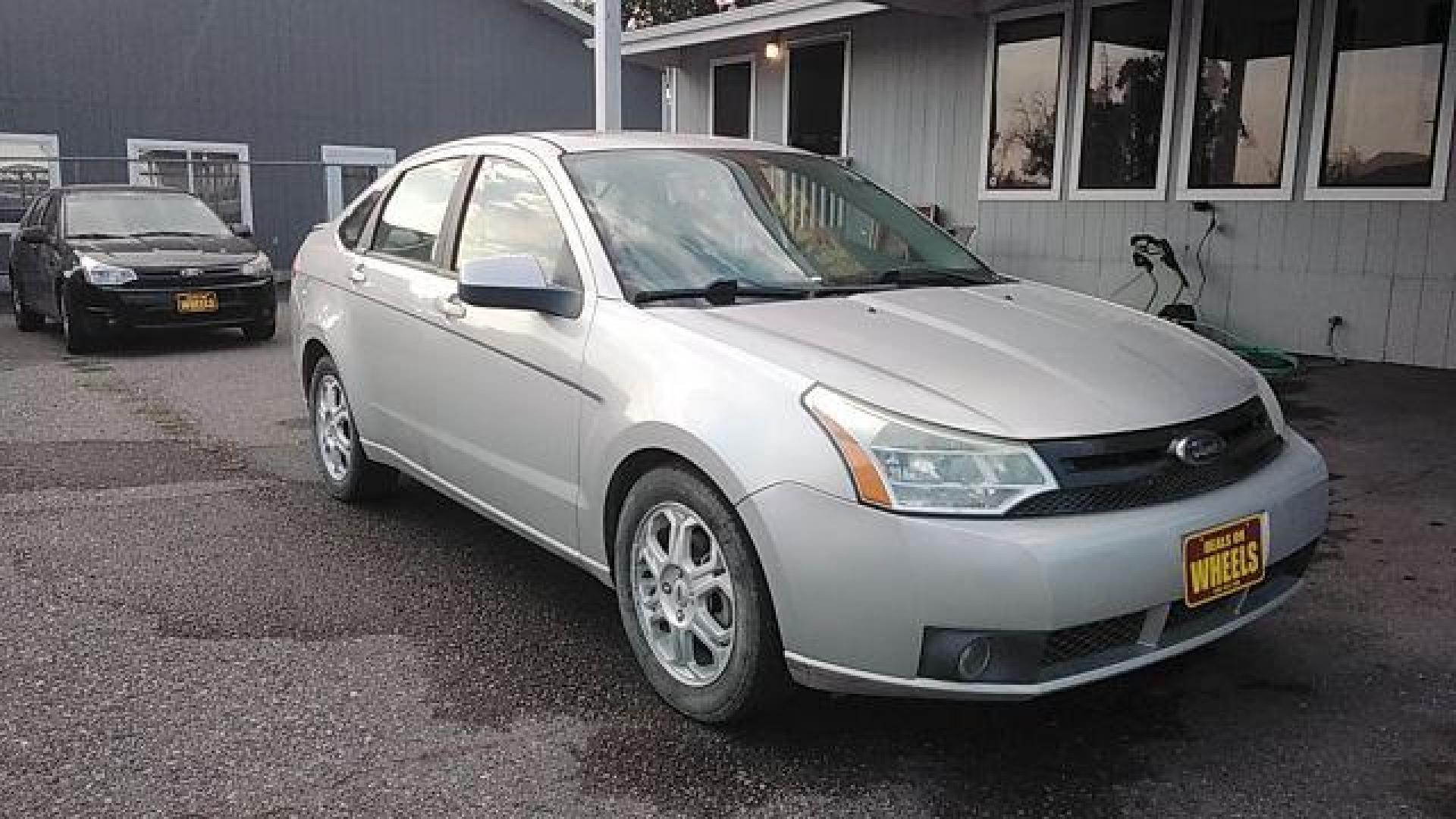 2009 Brilliant Silver Met Ford Focus SES Sedan (1FAHP36N89W) with an 2.0L L4 DOHC 16V engine, located at 1821 N Montana Ave., Helena, MT, 59601, 0.000000, 0.000000 - Photo#2