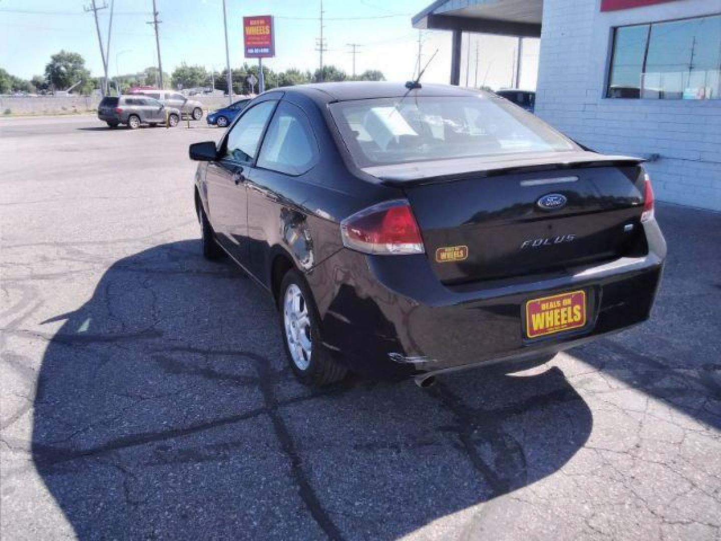 2009 Ford Focus SE Coupe (1FAHP32N69W) with an 2.0L L4 DOHC 16V engine, located at 4801 10th Ave S,, Great Falls, MT, 59405, 0.000000, 0.000000 - Photo#2