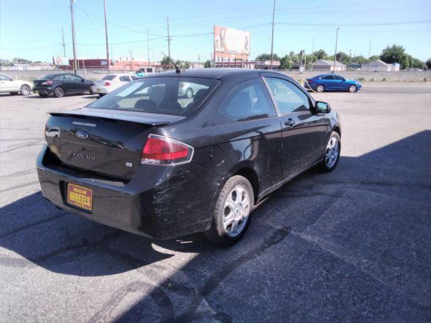 2009 Ford Focus SE Coupe (1FAHP32N69W) with an 2.0L L4 DOHC 16V engine, located at 4801 10th Ave S,, Great Falls, MT, 59405, 0.000000, 0.000000 - Photo#4