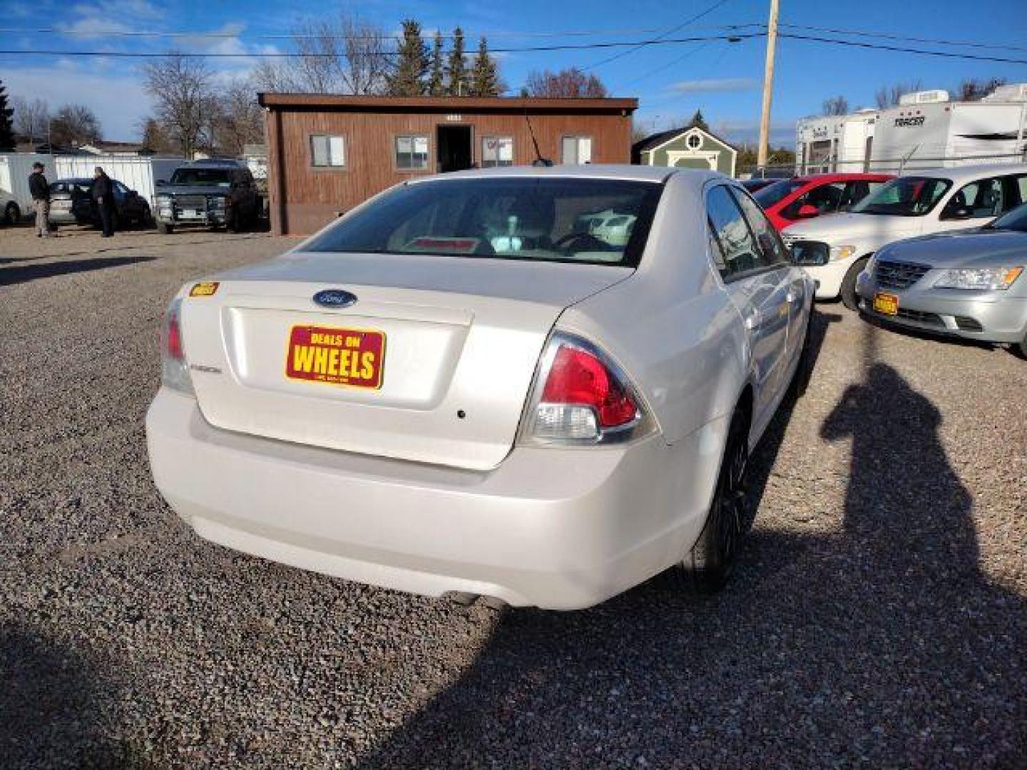 2009 Ford Fusion I4 S (3FAHP06Z19R) with an 2.3L L4 DOHC 16V engine, located at 4801 10th Ave S,, Great Falls, MT, 59405, 0.000000, 0.000000 - Photo#4