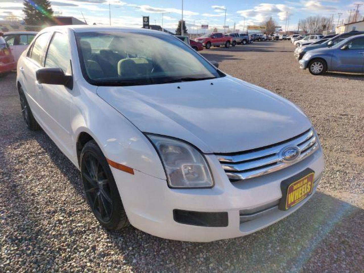 2009 Ford Fusion I4 S (3FAHP06Z19R) with an 2.3L L4 DOHC 16V engine, located at 4801 10th Ave S,, Great Falls, MT, 59405, 0.000000, 0.000000 - Photo#6