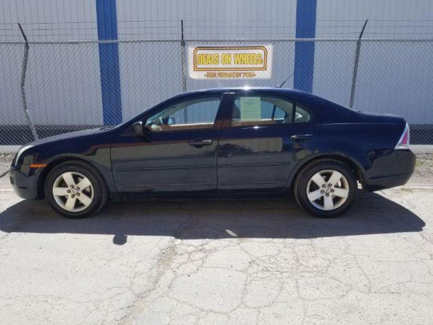 2009 Ford Fusion I4 SE (3FAHP07Z89R) with an 2.3L L4 DOHC 16V engine, located at 4801 10th Ave S,, Great Falls, MT, 59405, 0.000000, 0.000000 - Photo#2