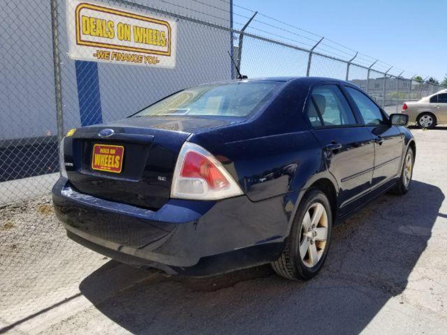 2009 Ford Fusion I4 SE (3FAHP07Z89R) with an 2.3L L4 DOHC 16V engine, located at 4801 10th Ave S,, Great Falls, MT, 59405, 0.000000, 0.000000 - Photo#4