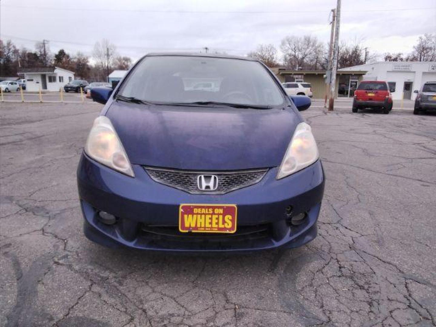 2009 Honda Fit Sport 5-Speed MT (JHMGE87409S) with an 1.5L L4 SOHC 16V engine, 5-Speed Manual transmission, located at 4047 Montana Ave., Billings, MT, 59101, 45.770847, -108.529800 - Photo#1