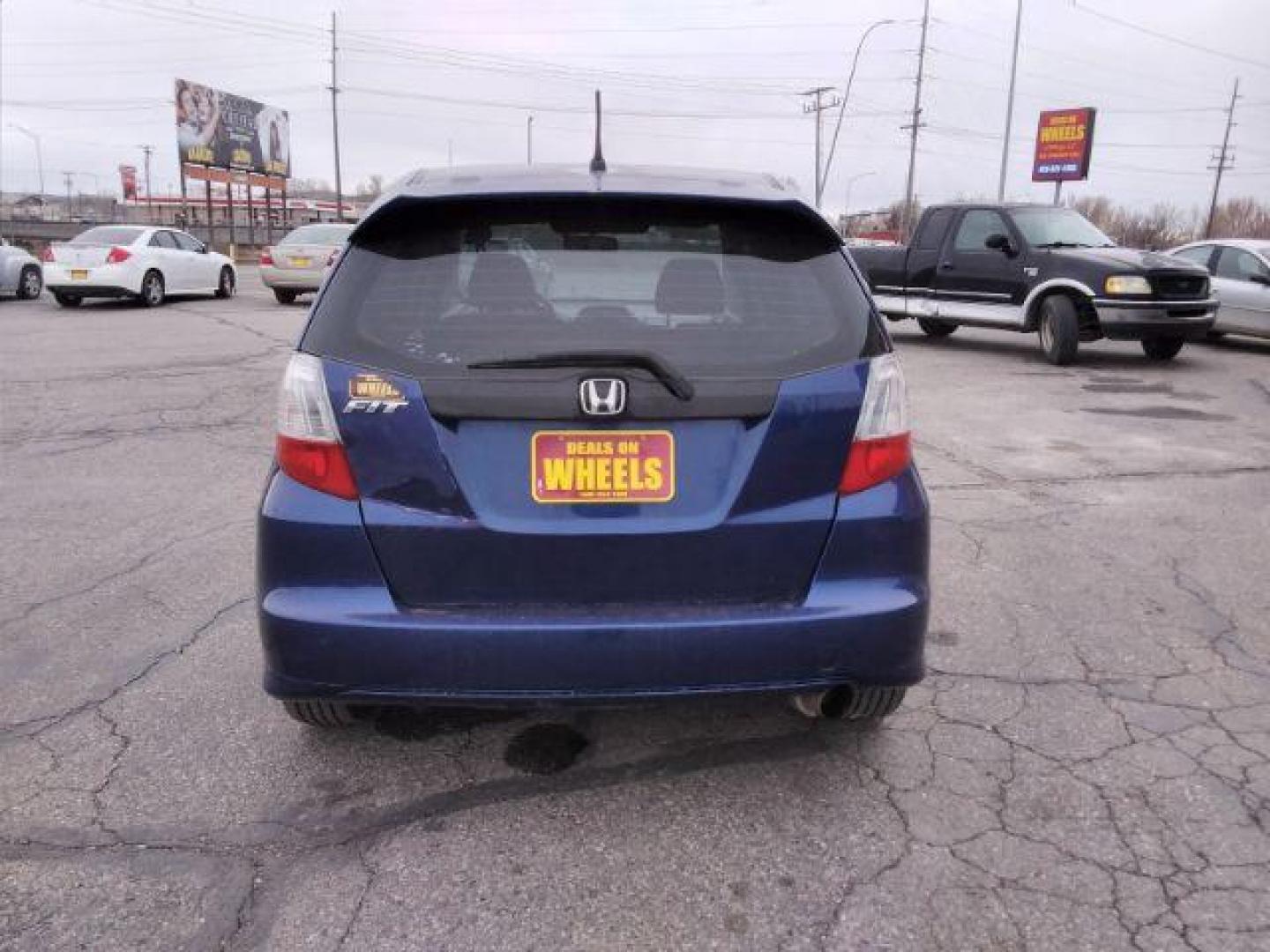 2009 Honda Fit Sport 5-Speed MT (JHMGE87409S) with an 1.5L L4 SOHC 16V engine, 5-Speed Manual transmission, located at 4047 Montana Ave., Billings, MT, 59101, 45.770847, -108.529800 - Photo#3