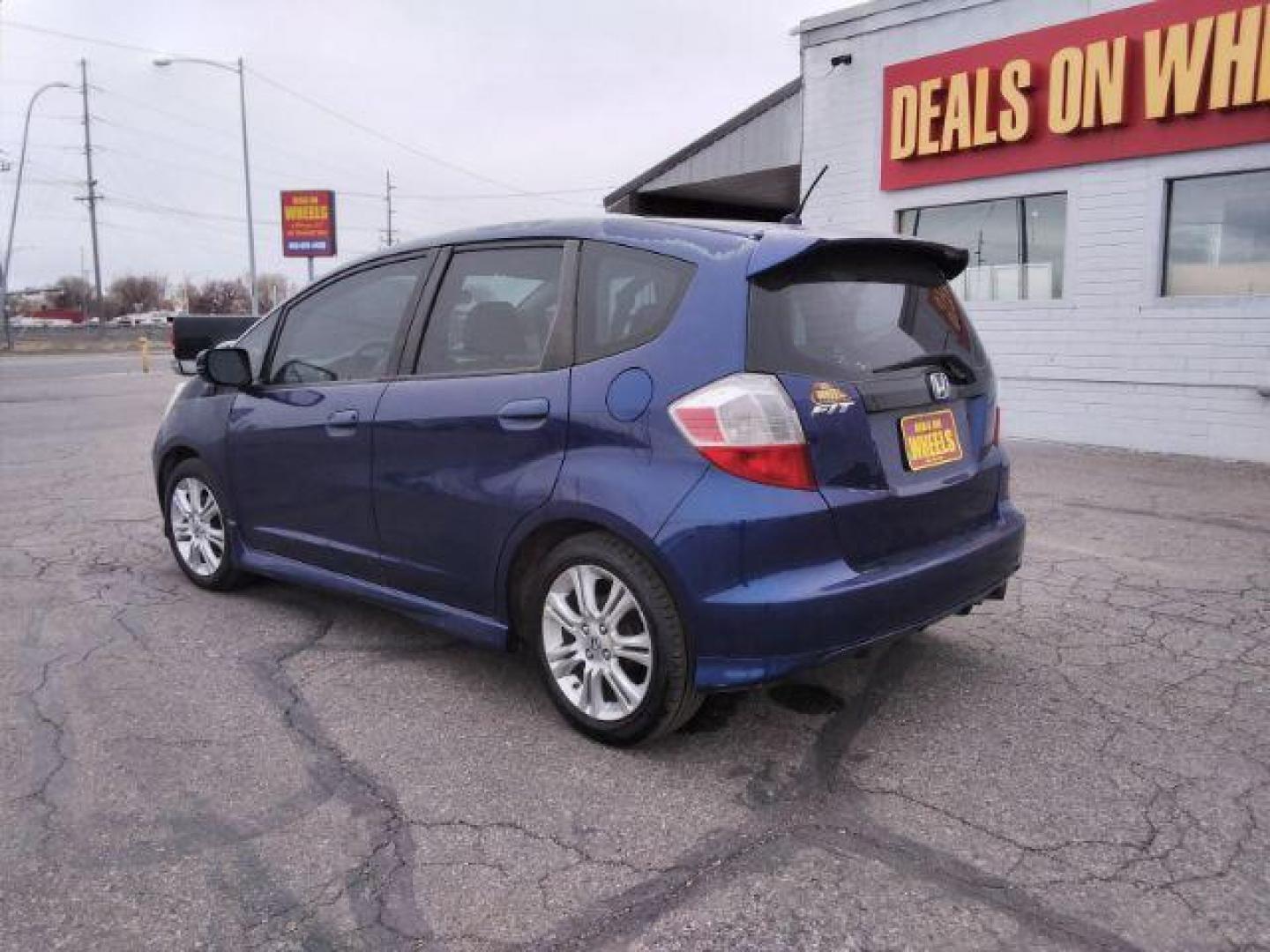 2009 Honda Fit Sport 5-Speed MT (JHMGE87409S) with an 1.5L L4 SOHC 16V engine, 5-Speed Manual transmission, located at 4047 Montana Ave., Billings, MT, 59101, 45.770847, -108.529800 - Photo#7