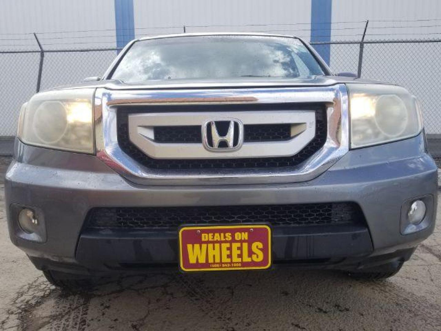 2009 Honda Pilot EX-L 4WD (5FNYF48589B) with an 3.5L V6 SOHC 24V engine, 5-Speed Automatic transmission, located at 1800 West Broadway, Missoula, 59808, (406) 543-1986, 46.881348, -114.023628 - Photo#1