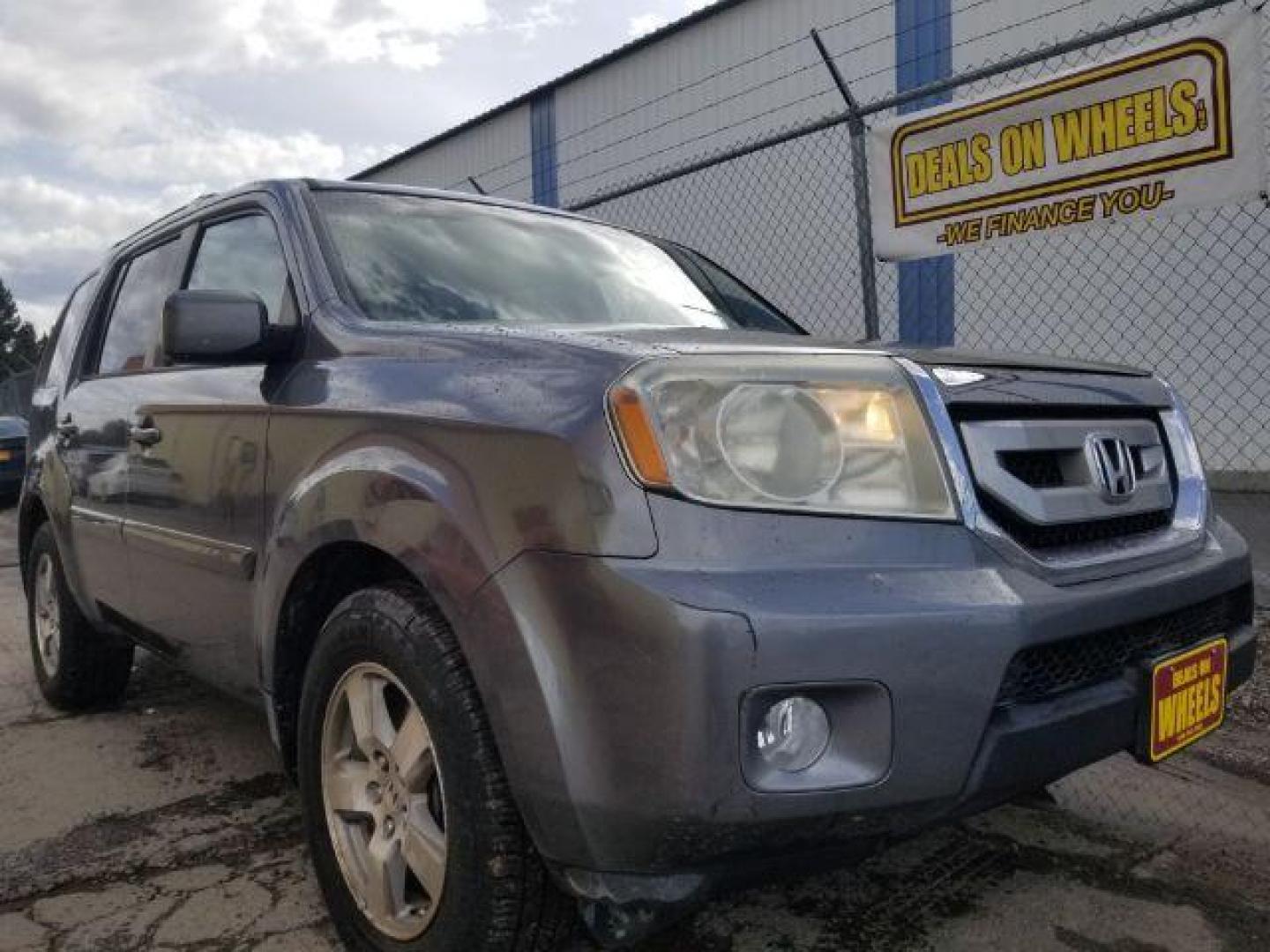 2009 Honda Pilot EX-L 4WD (5FNYF48589B) with an 3.5L V6 SOHC 24V engine, 5-Speed Automatic transmission, located at 1800 West Broadway, Missoula, 59808, (406) 543-1986, 46.881348, -114.023628 - Photo#2