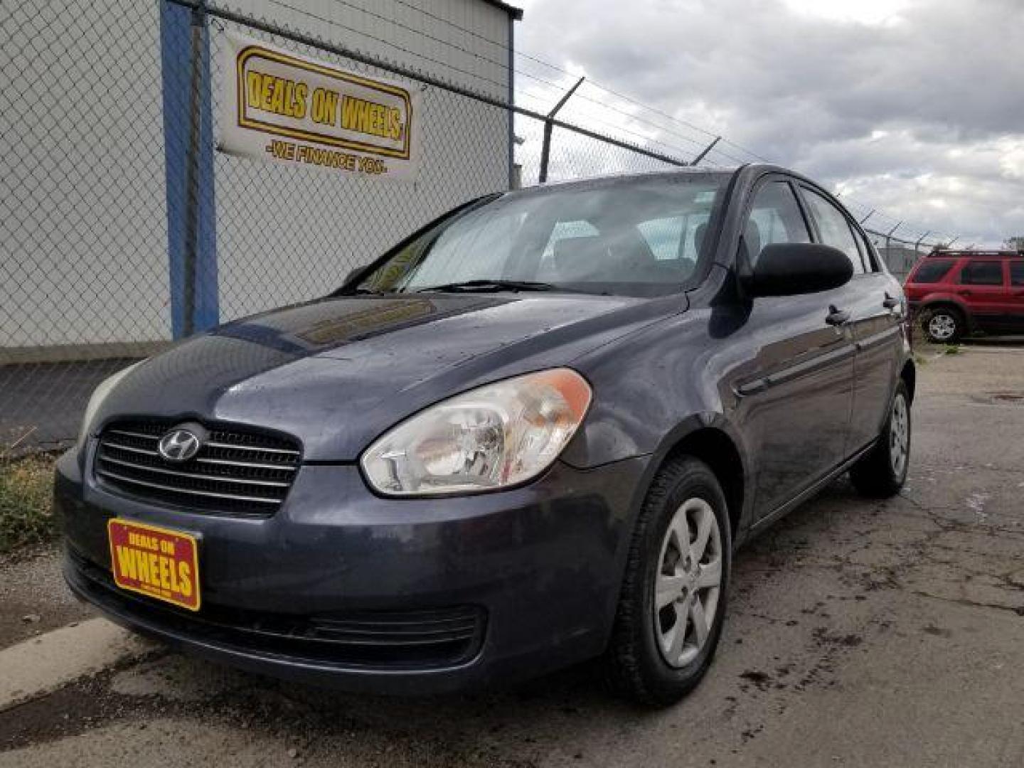 2009 Hyundai Accent GLS 4-Door (KMHCM46C99U) with an 1.6L L4 DOHC 16V engine, located at 601 E. Idaho St., Kalispell, MT, 59901, 0.000000, 0.000000 - Photo#0