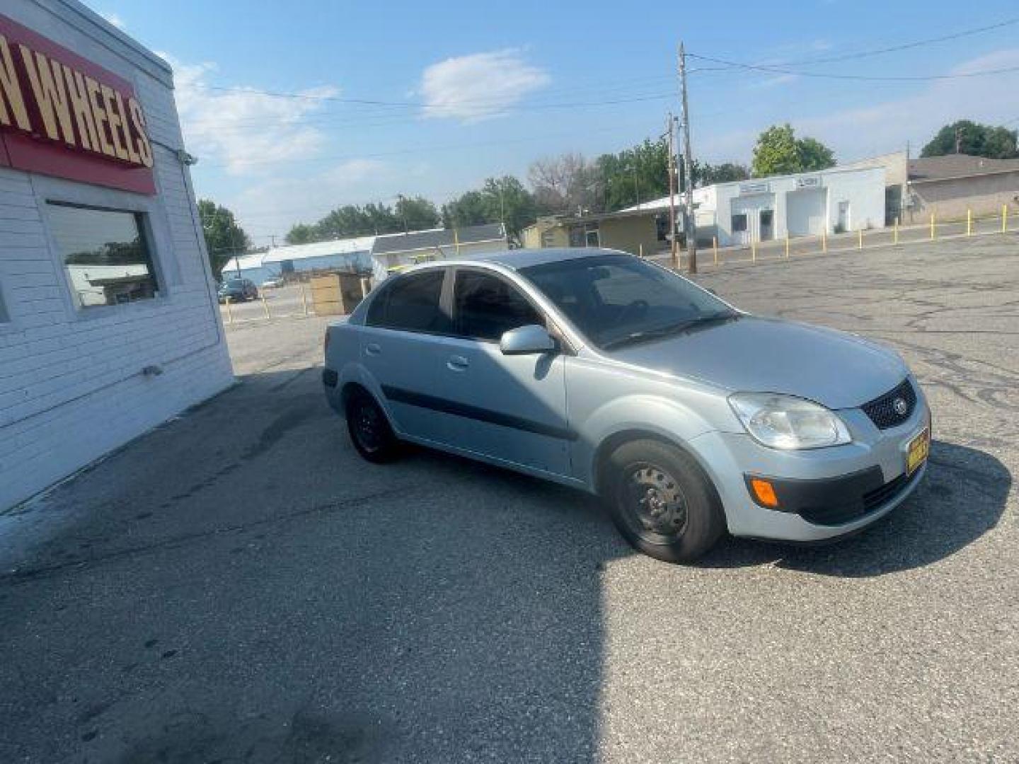 2009 Kia Rio Base (KNADE223296) with an 1.6L L4 DOHC 16V engine, 5-Speed Manual transmission, located at 4047 Montana Ave., Billings, MT, 59101, 45.770847, -108.529800 - Photo#1