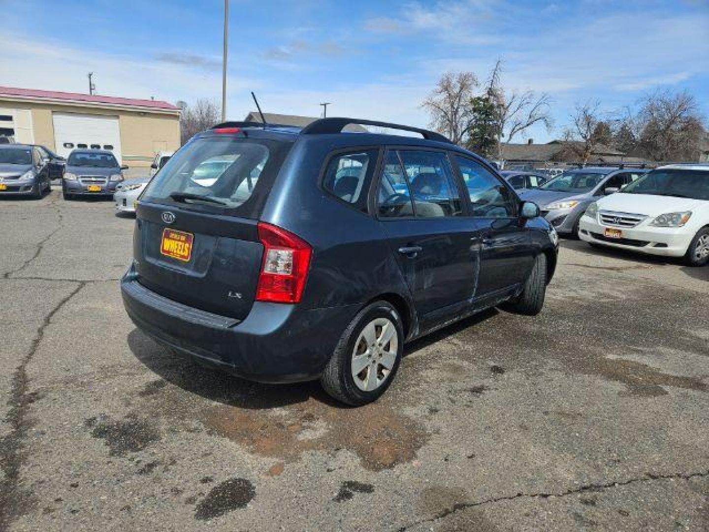 2009 Kia Rondo LX (KNAFG529097) with an 2.4L L4 DOHC 16V engine, 4-Speed Automatic transmission, located at 1821 N Montana Ave., Helena, MT, 59601, 0.000000, 0.000000 - Photo#3