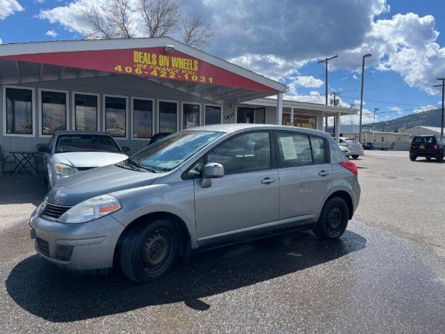 2009 Nissan Versa 1.8 S Hatchback (3N1BC13EX9L) with an 1.8L L4 DOHC 16V engine, located at 1821 N Montana Ave., Helena, MT, 59601, 0.000000, 0.000000 - Photo#0