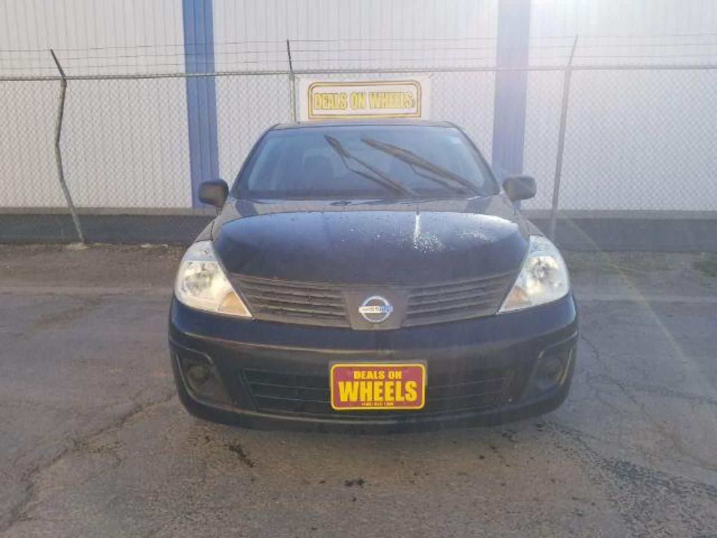 2009 Nissan Versa 1.6 Base Sedan (3N1CC11E79L) with an 1.6L L4 DOHC 16V engine, 5-Speed Manual transmission, located at 601 E. Idaho St., Kalispell, MT, 59901, 0.000000, 0.000000 - Photo#1