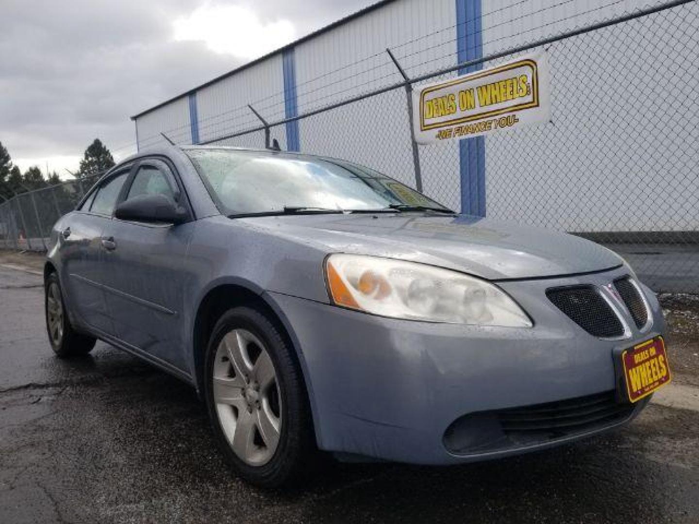 2009 Pontiac G6 Sedan (1G2ZG57BX94) with an 2.4L L4 DOHC 16V engine, 4-Speed Automatic transmission, located at 4801 10th Ave S,, Great Falls, MT, 59405, 0.000000, 0.000000 - Photo#2