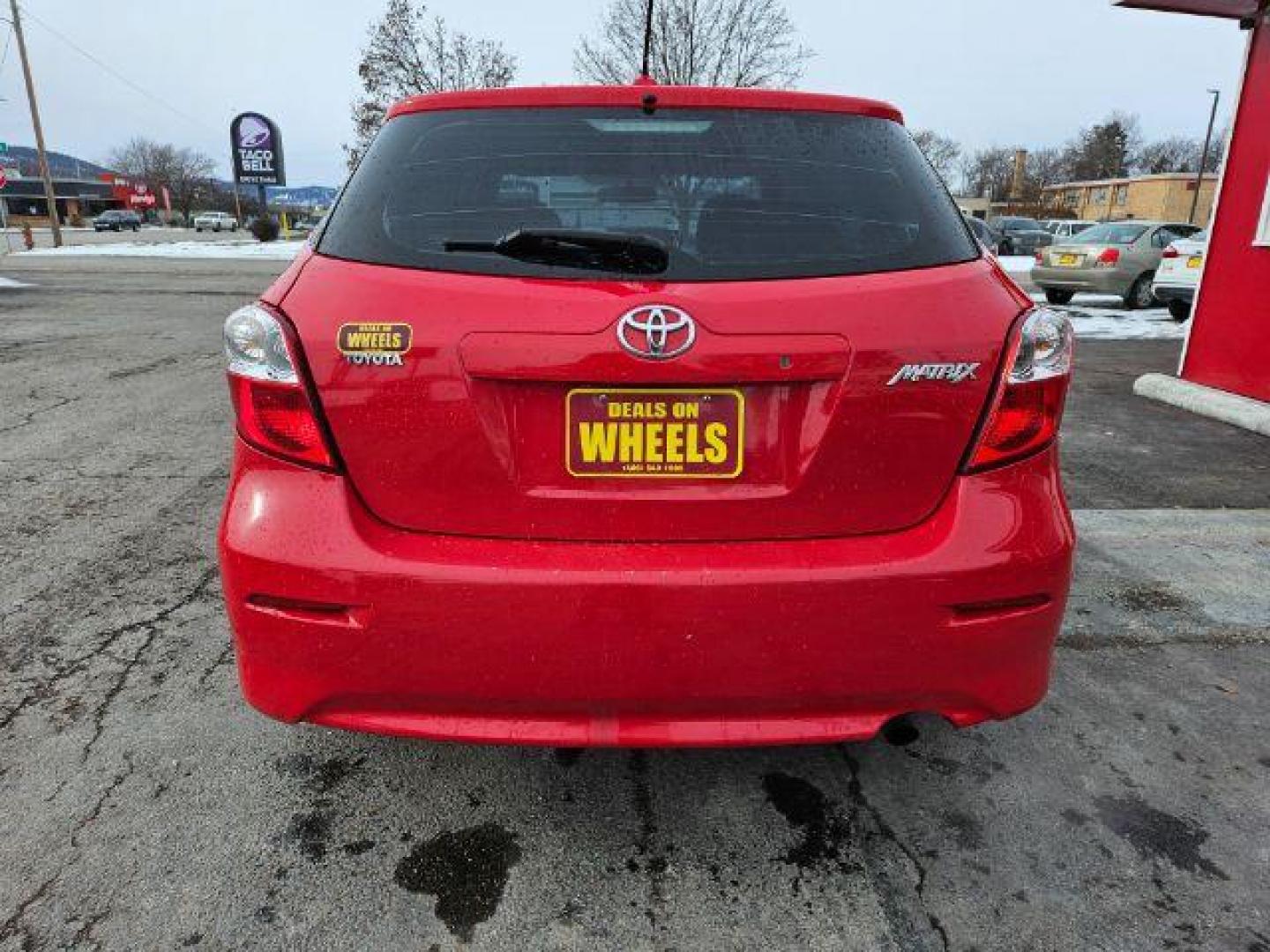 2009 Radiant Red Toyota Matrix Base 5-Speed MT (2T1KU40E09C) with an 1.8L L4 DOHC 16V engine, 5-Speed Manual transmission, located at 601 E. Idaho St., Kalispell, MT, 59901, 0.000000, 0.000000 - Photo#3