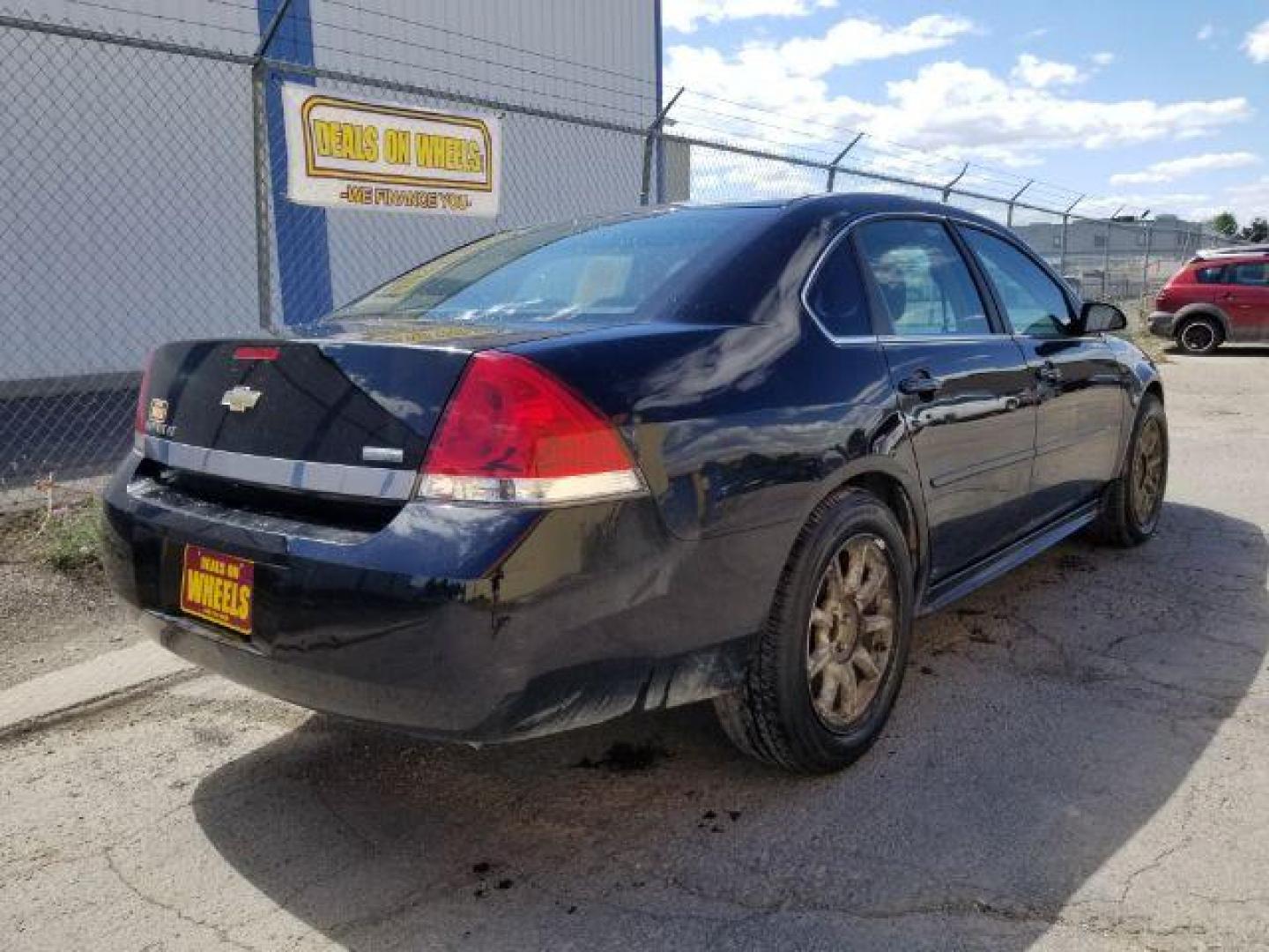 2010 Chevrolet Impala LT (2G1WB5EK4A1) with an 3.5L V6 OHV 12V FFV engine, 4-Speed Automatic transmission, located at 4047 Montana Ave., Billings, MT, 59101, 45.770847, -108.529800 - Photo#4