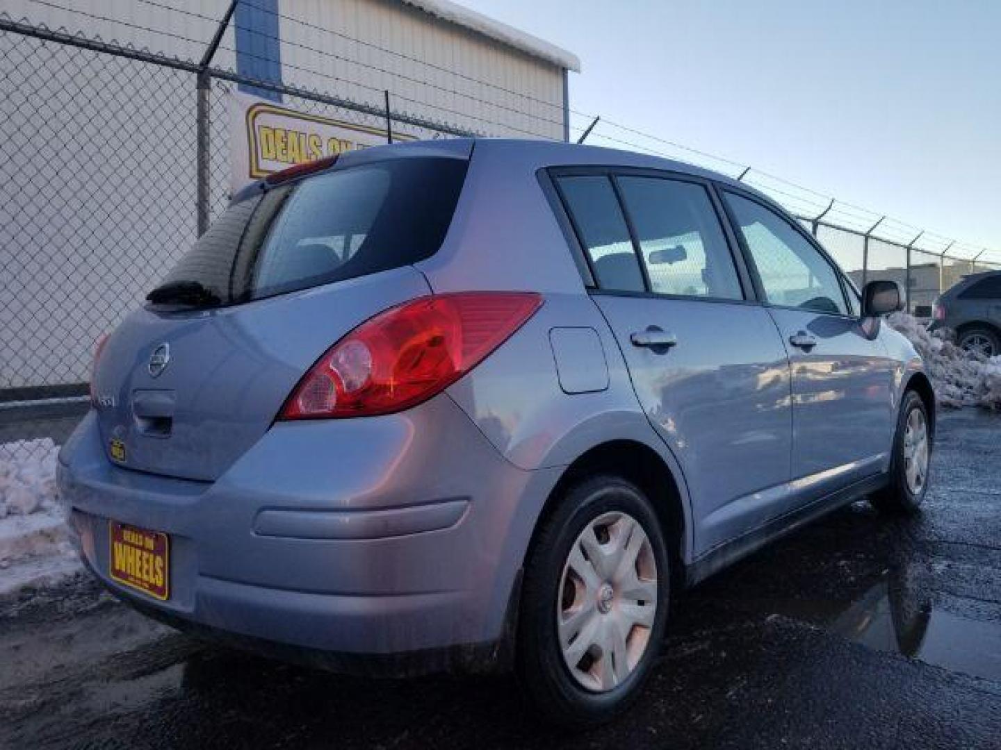 2010 Nissan Versa 1.8 SL Hatchback (3N1BC1CP2AL) with an 1.8L L4 DOHC 16V engine, Continuously Variable Transmission transmission, located at 601 E. Idaho St., Kalispell, MT, 59901, 0.000000, 0.000000 - Photo#4