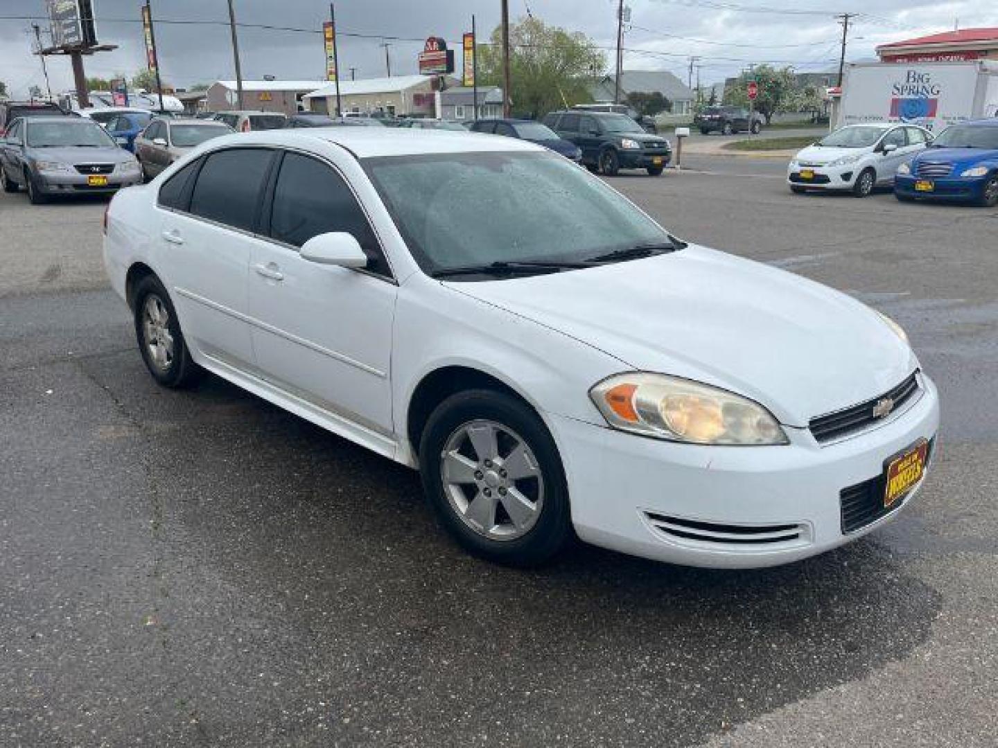 2011 Summit White Chevrolet Impala LS (2G1WF5EK9B1) with an 3.5L V6 OHV 16V FFV engine, 4-Speed Automatic transmission, located at 1821 N Montana Ave., Helena, MT, 59601, 0.000000, 0.000000 - Photo#2