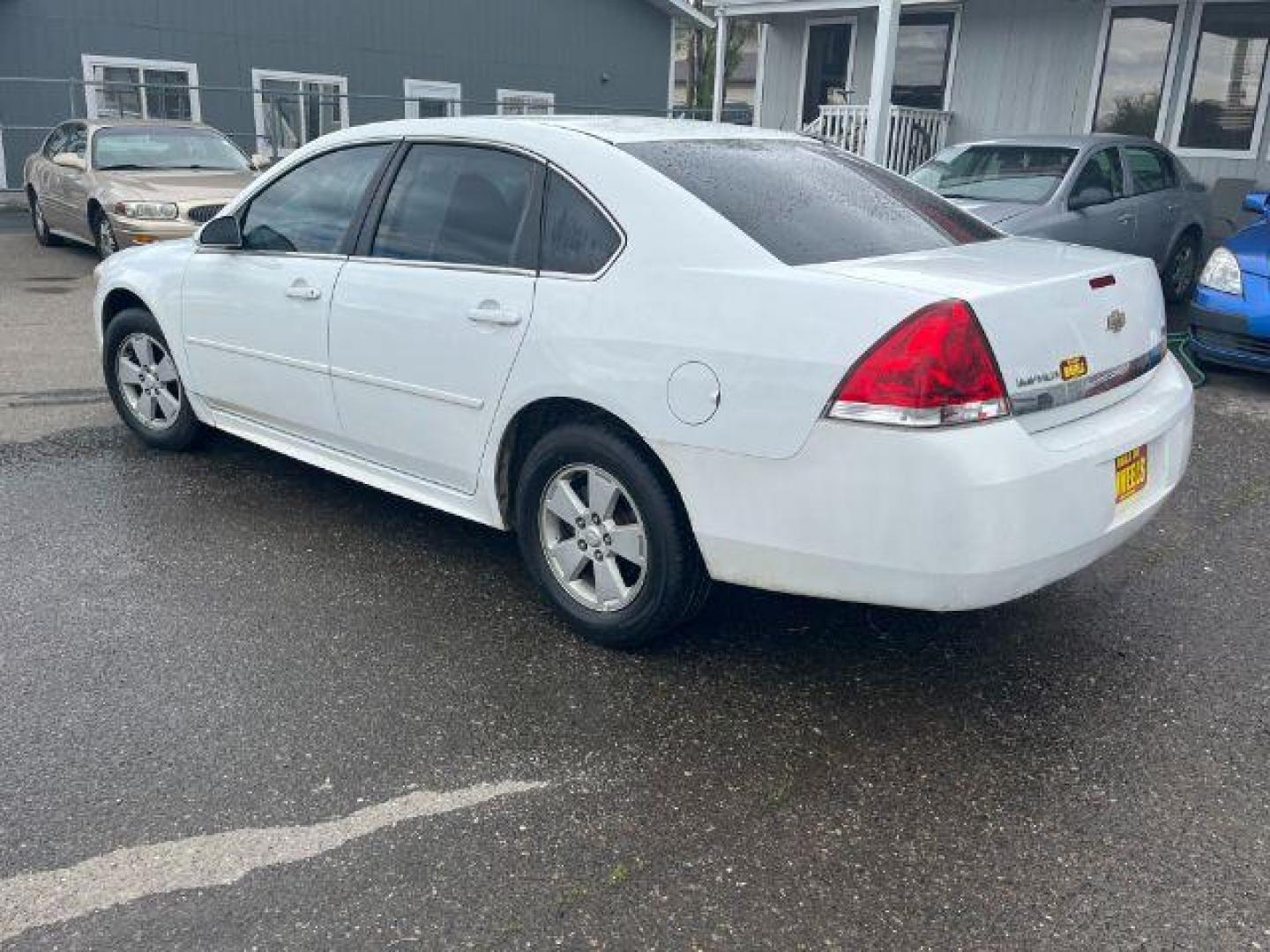 2011 Summit White Chevrolet Impala LS (2G1WF5EK9B1) with an 3.5L V6 OHV 16V FFV engine, 4-Speed Automatic transmission, located at 1821 N Montana Ave., Helena, MT, 59601, 0.000000, 0.000000 - Photo#5