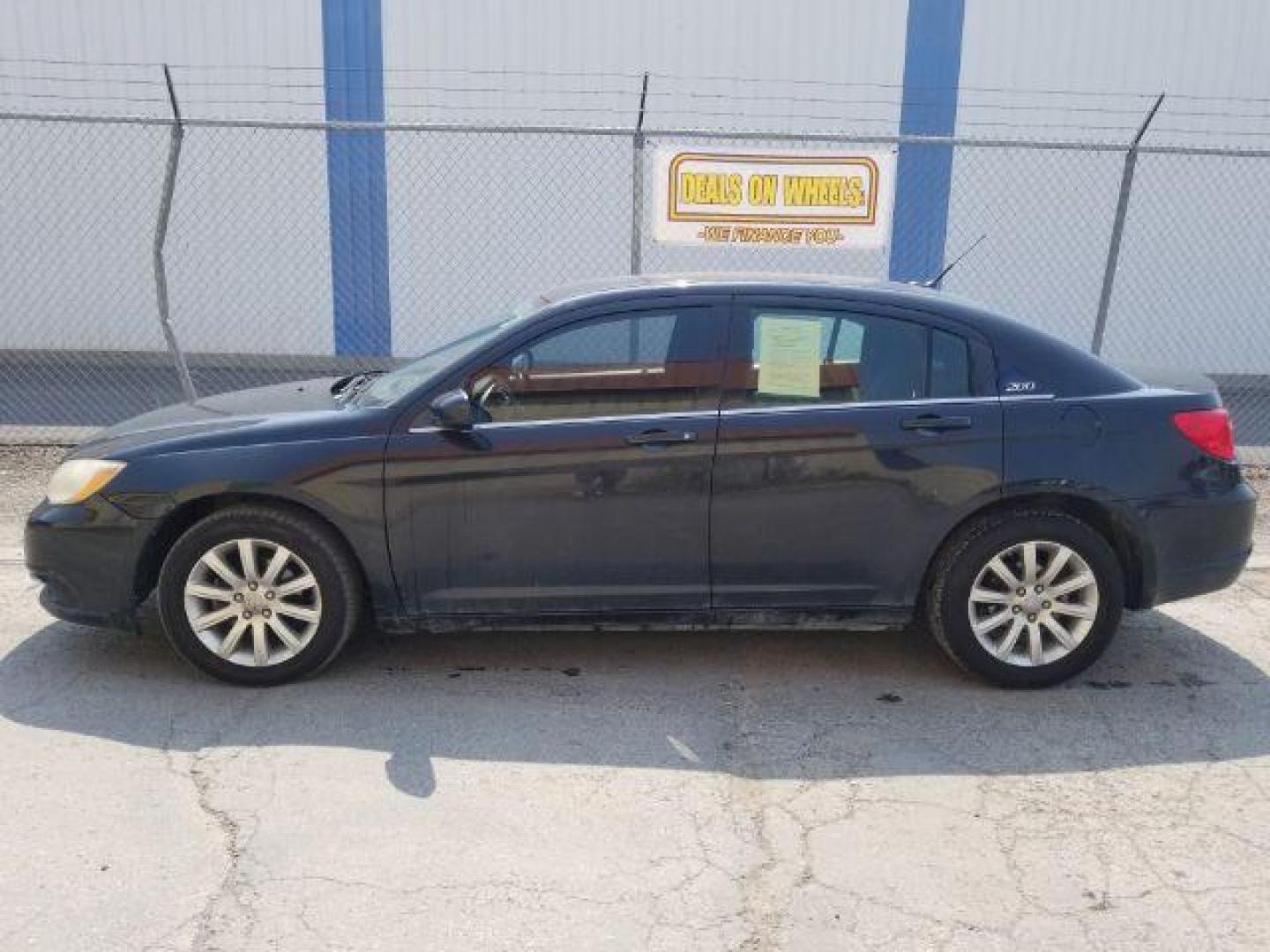 2011 Chrysler 200 Touring (1C3BC1FG1BN) with an 3.6L V6 DOHC 24V FFV engine, 6-Speed Automatic transmission, located at 1800 West Broadway, Missoula, 59808, (406) 543-1986, 46.881348, -114.023628 - Photo#2