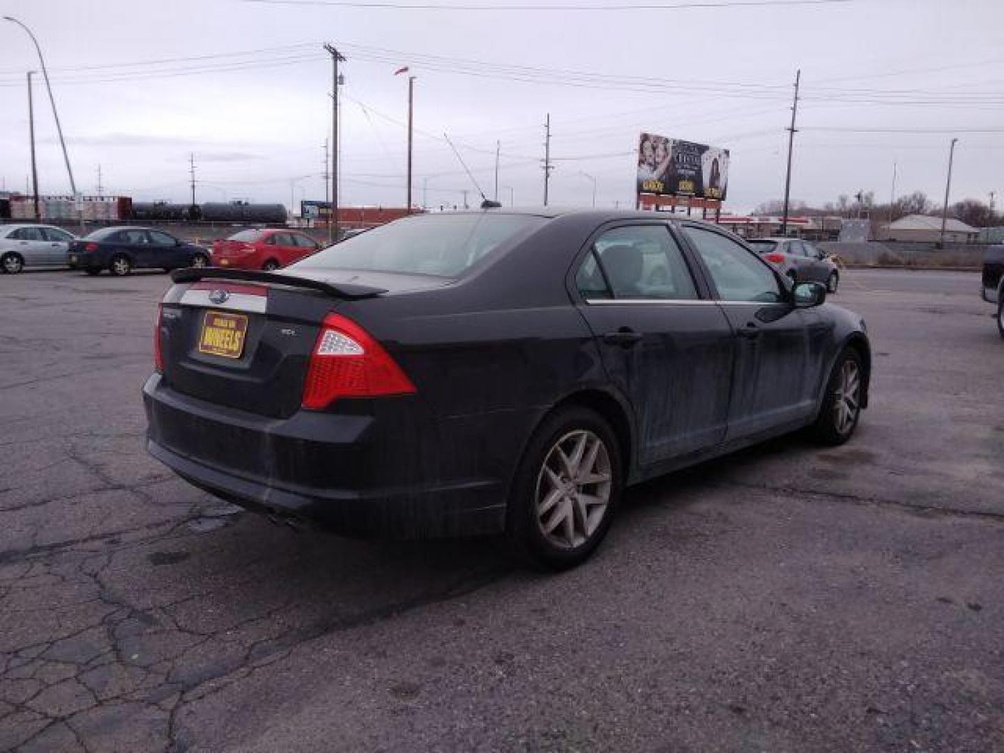 2011 Ford Fusion I4 SEL (3FAHP0JA5BR) with an 2.5L L4 DOHC 16V engine, located at 4047 Montana Ave., Billings, MT, 59101, 45.770847, -108.529800 - Photo#5