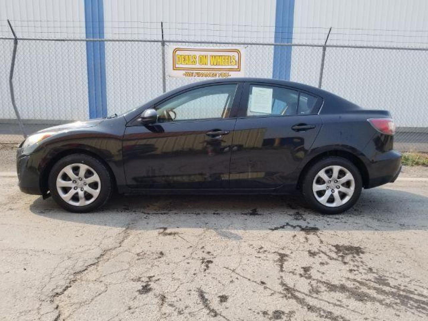 2011 Black Mica Mazda MAZDA3 i Sport 4-Door (JM1BL1UG6B1) with an 2.0L L4 DOHC 16V engine, located at 4801 10th Ave S,, Great Falls, MT, 59405, 0.000000, 0.000000 - Photo#2