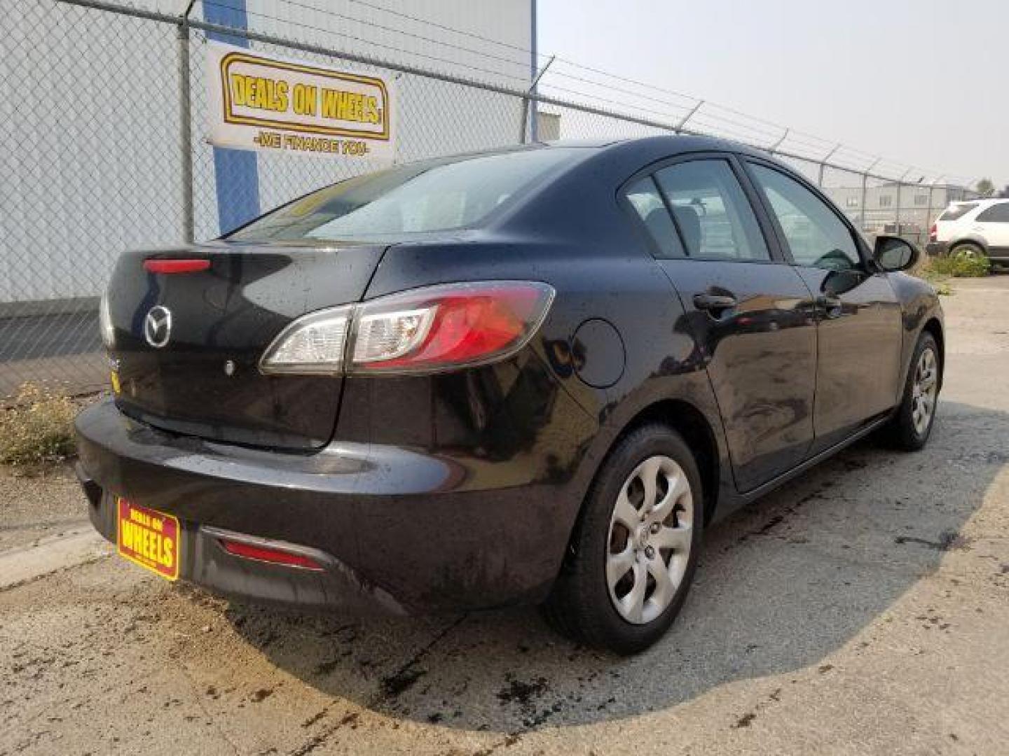 2011 Black Mica Mazda MAZDA3 i Sport 4-Door (JM1BL1UG6B1) with an 2.0L L4 DOHC 16V engine, located at 4801 10th Ave S,, Great Falls, MT, 59405, 0.000000, 0.000000 - Photo#4