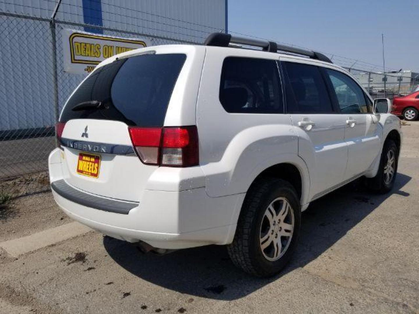 2011 Mitsubishi Endeavor LS AWD (4A4JN2AS9BE) with an 3.8L V6 SOHC 24V engine, 4-Speed Automatic transmission, located at 4047 Montana Ave., Billings, MT, 59101, 45.770847, -108.529800 - Photo#4