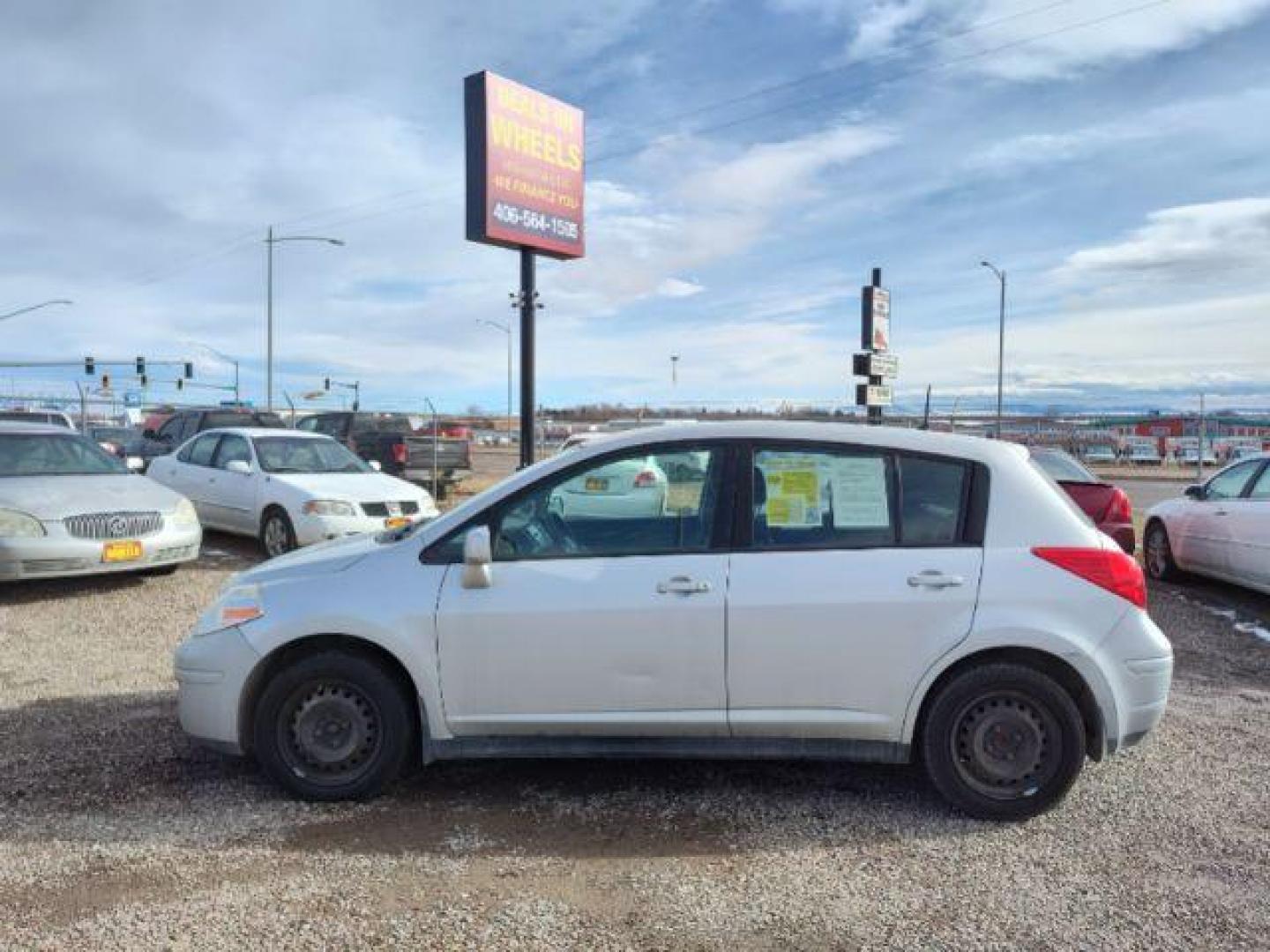 2011 Nissan Versa 1.8 SL Hatchback (3N1BC1CP9BL) with an 1.8L L4 DOHC 16V engine, 6 Speed Manual Trans transmission, located at 4801 10th Ave S,, Great Falls, MT, 59405, 0.000000, 0.000000 - Photo#1