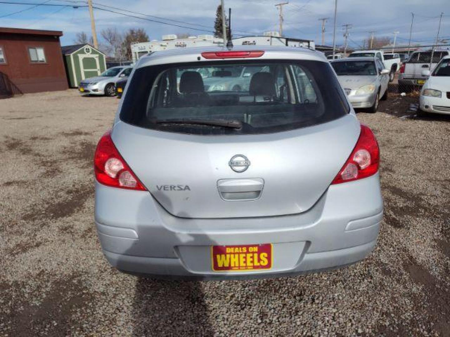 2011 Nissan Versa 1.8 SL Hatchback (3N1BC1CP9BL) with an 1.8L L4 DOHC 16V engine, 6 Speed Manual Trans transmission, located at 4801 10th Ave S,, Great Falls, MT, 59405, 0.000000, 0.000000 - Photo#3